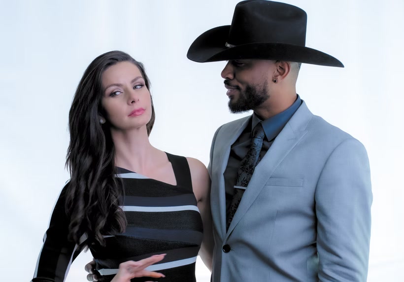 Kirk and Ashley, with Kirk wearing a cowboy hat